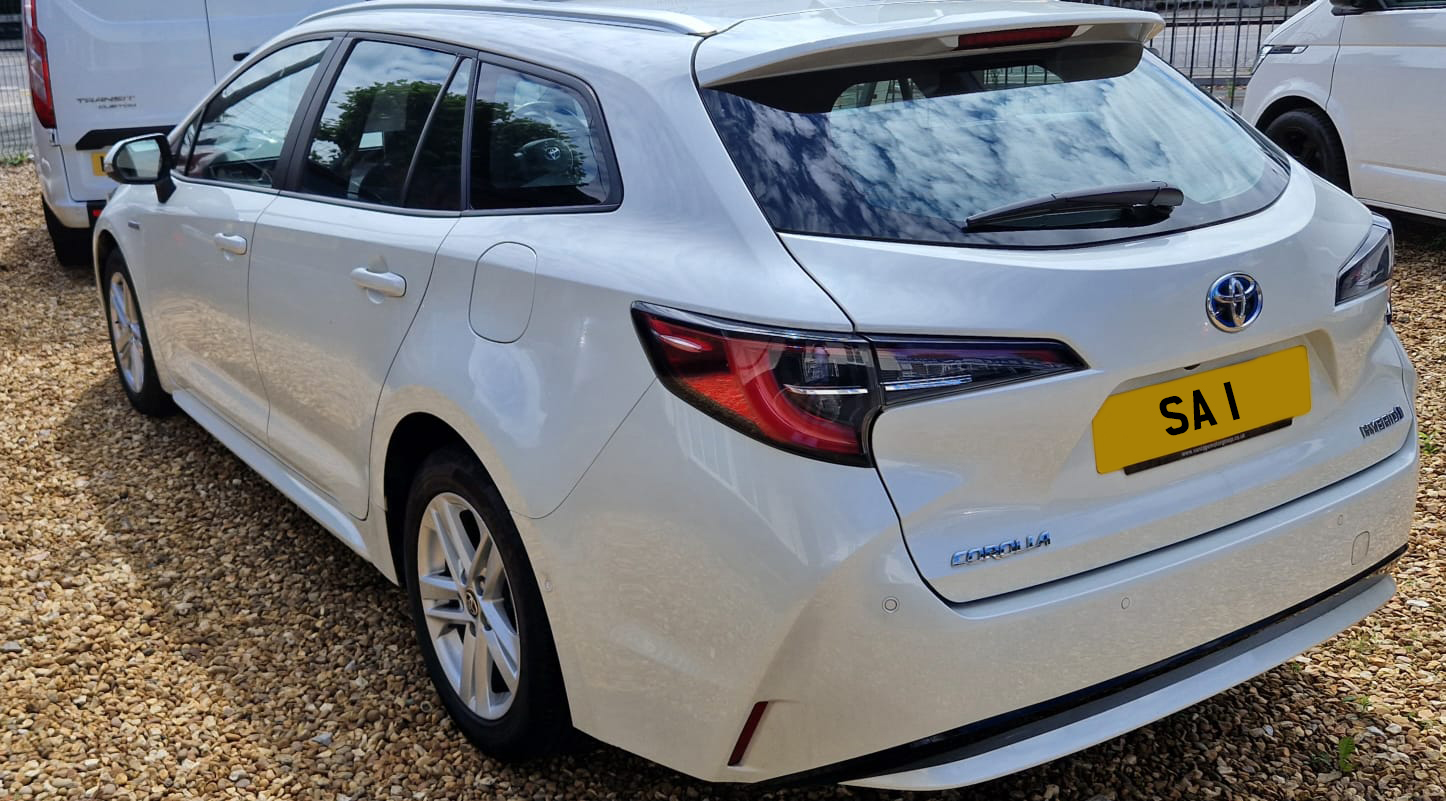 White Toyota Corolla estate used for airport transfers